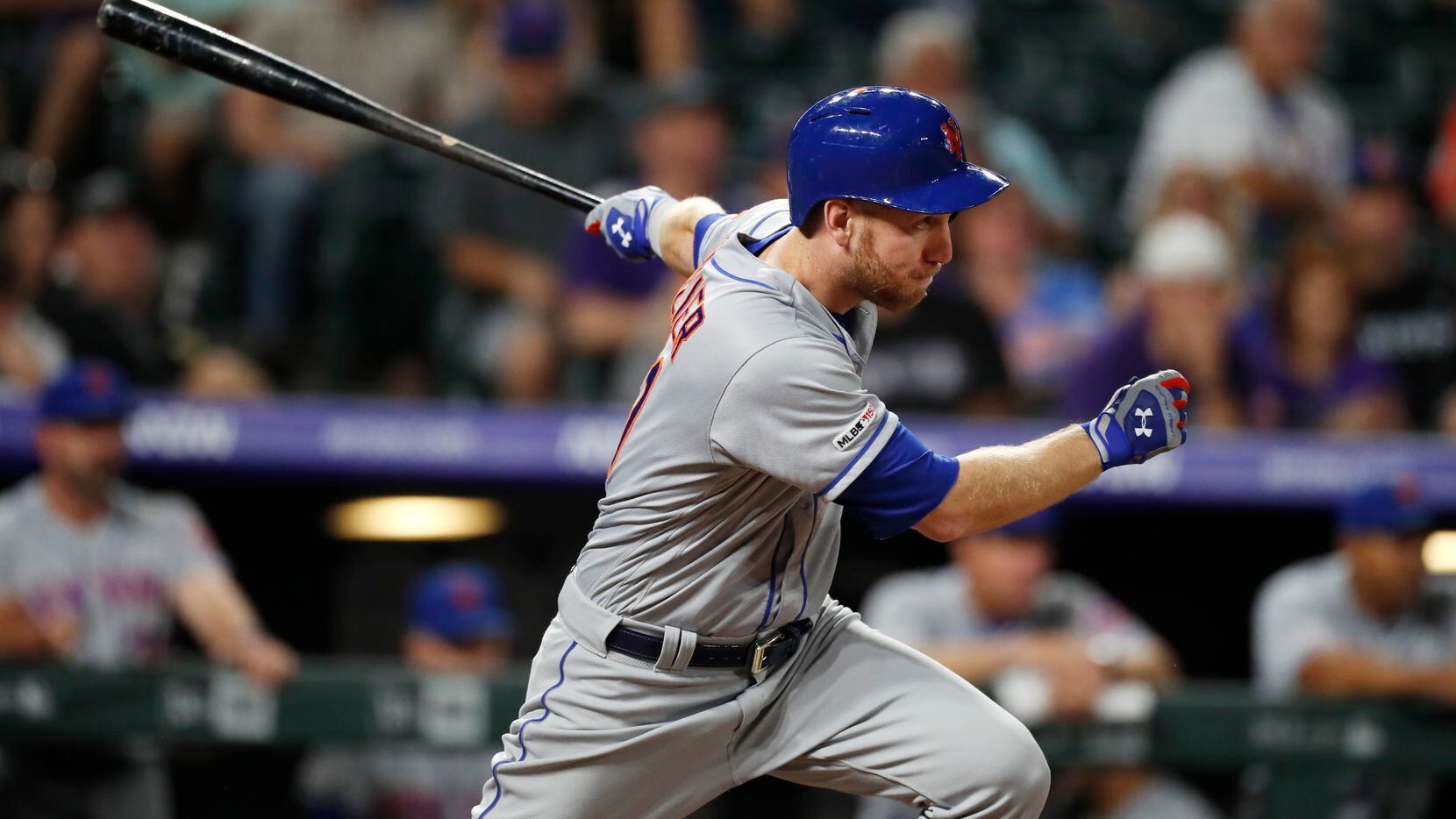 FILE - New York Mets' Todd Frazier watches his RBI single off Colorado Rockies pitcher Rico...