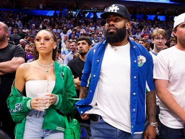 Dallas Cowboys running back Ezekiel Elliott (right) was on the sideline for Game 6 of a NBA...