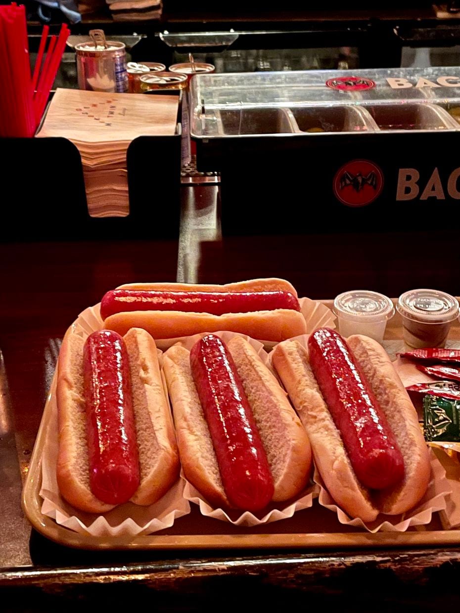 At Mike's Gemini Lounge in Dallas' Cedars neighborhood, a little hot dog roller sits on the...