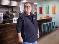 Jesús Carmona, the owner of Milagro Tacos Cantina, poses at his restaurant on Wednesday, Jan. 19, 2022, in Dallas.