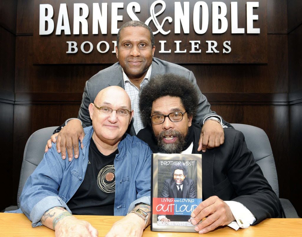 Biographer David Ritz, left, Tavis Smiley, top, and Dr. Cornel West at an October 2009 book...