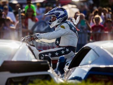 Daredevil Robbie Knievel prepares to jump over 18 Corvettes during a celebration and...
