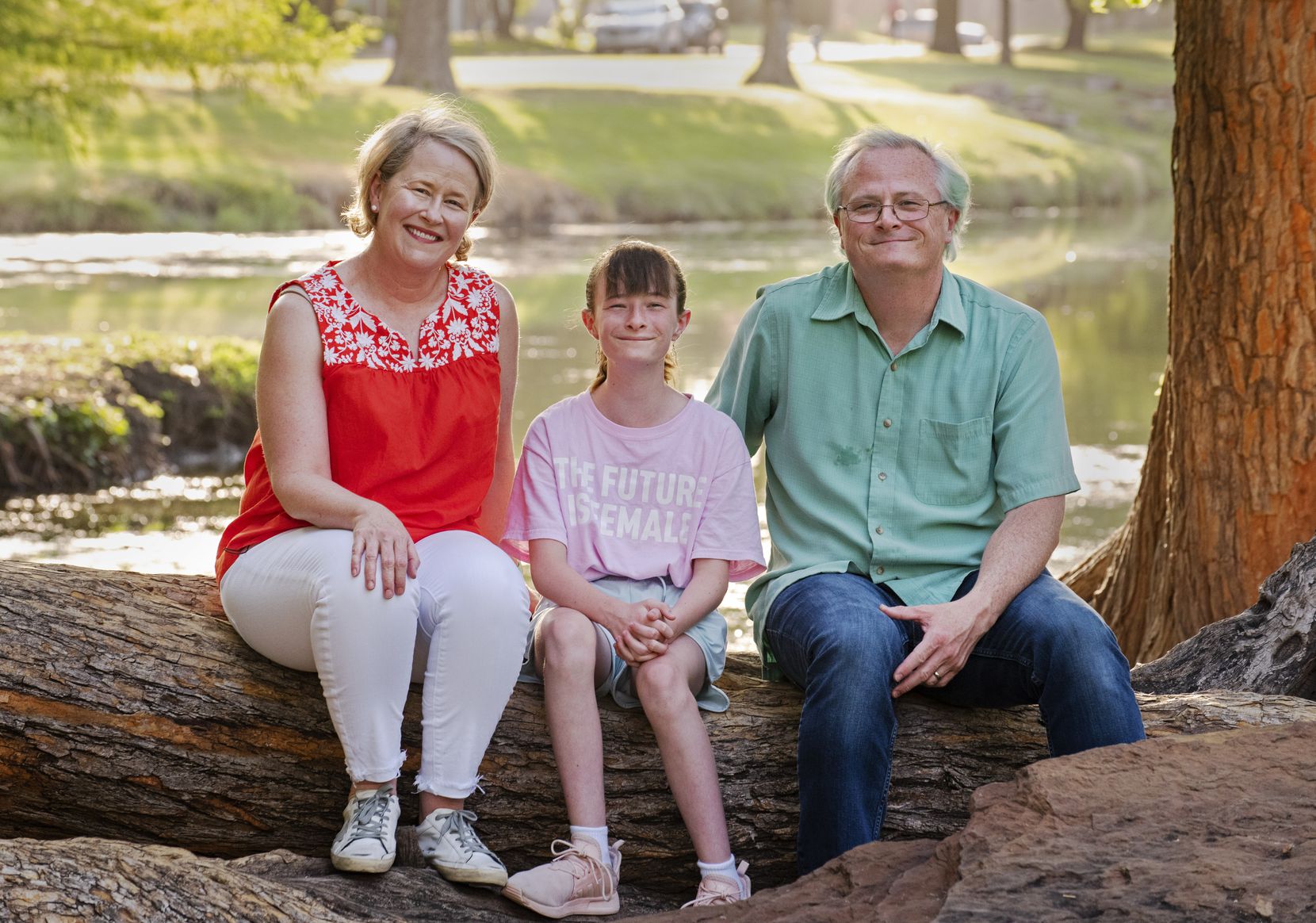 Claire Aldridge, left, Matt Burnside, and their 12-year-old daughter Lucy Burnside at a city...