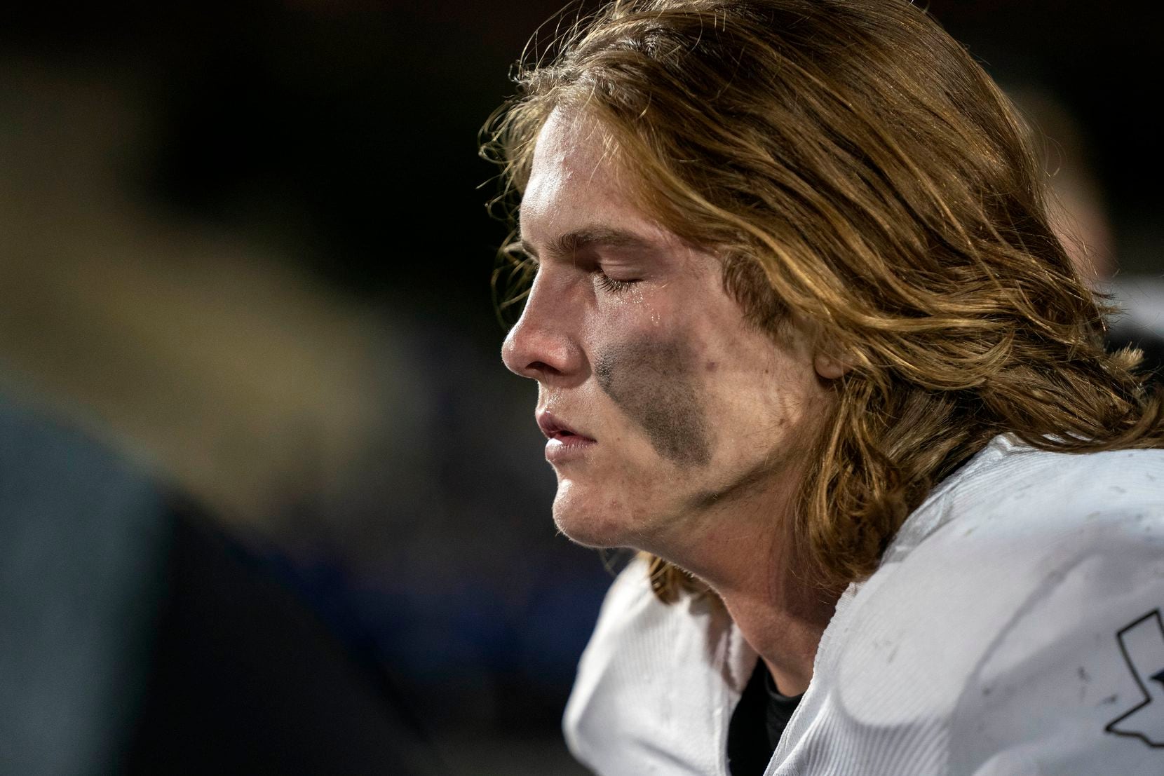 Hebron tight end Carter Brock takes a moment to himself after his team lost 59-30 to Allen...