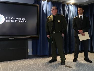 Brian Hastings,  chief of operations for the border patrol, left, and U.S. Customs and...