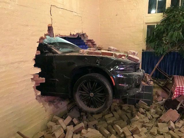 This Dodge car was driven through the wall of S&D Oyster Company in Uptown Dallas in the...