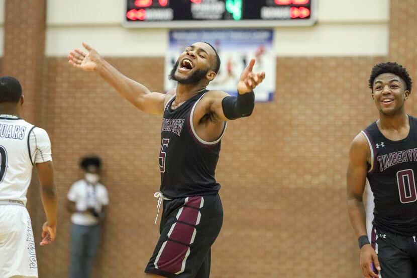 Mansfield Timberview guard Jared Washington (5) celebrates after a win against Mansfield...