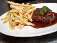 Steak frites are a popular lunch order at Wicked Butcher in the Sinclair Hotel in downtown...