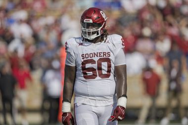 Oklahoma offensive lineman Tyler Guyton (60) during the first half of an NCAA college...