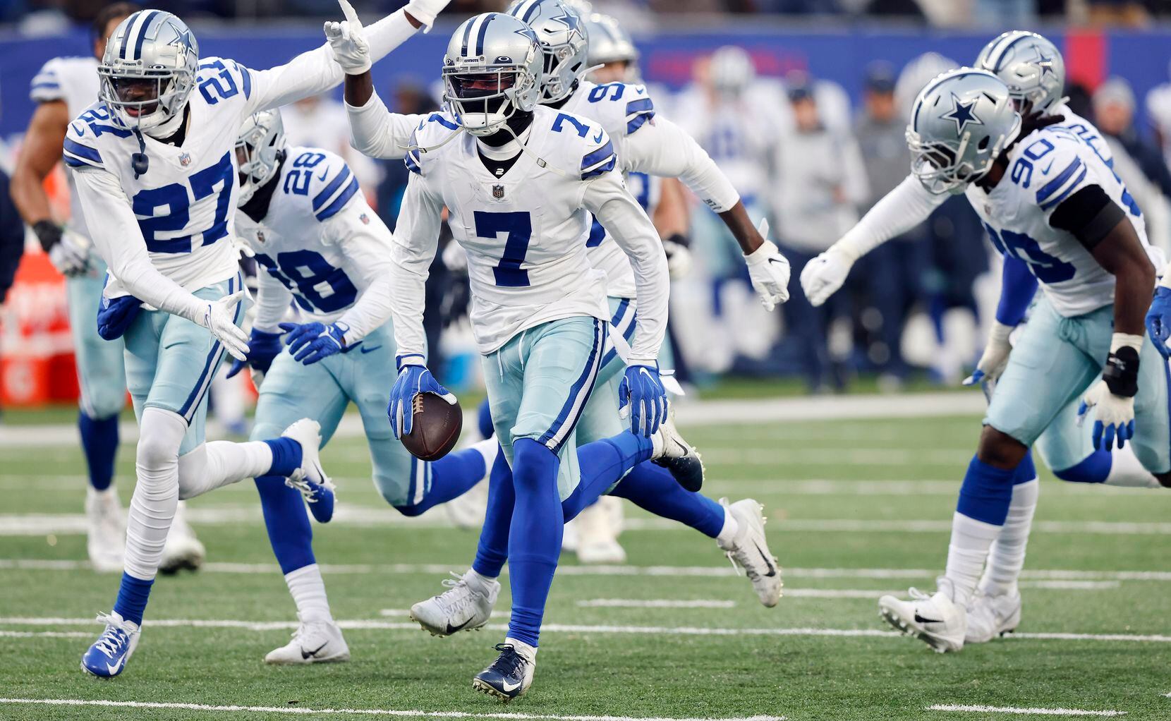 Dallas Cowboys cornerback Trevon Diggs (7) and teammates race to the end zone against the...