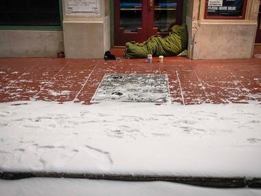 With temperatures already falling into the single digits homeless person sleeps in the...