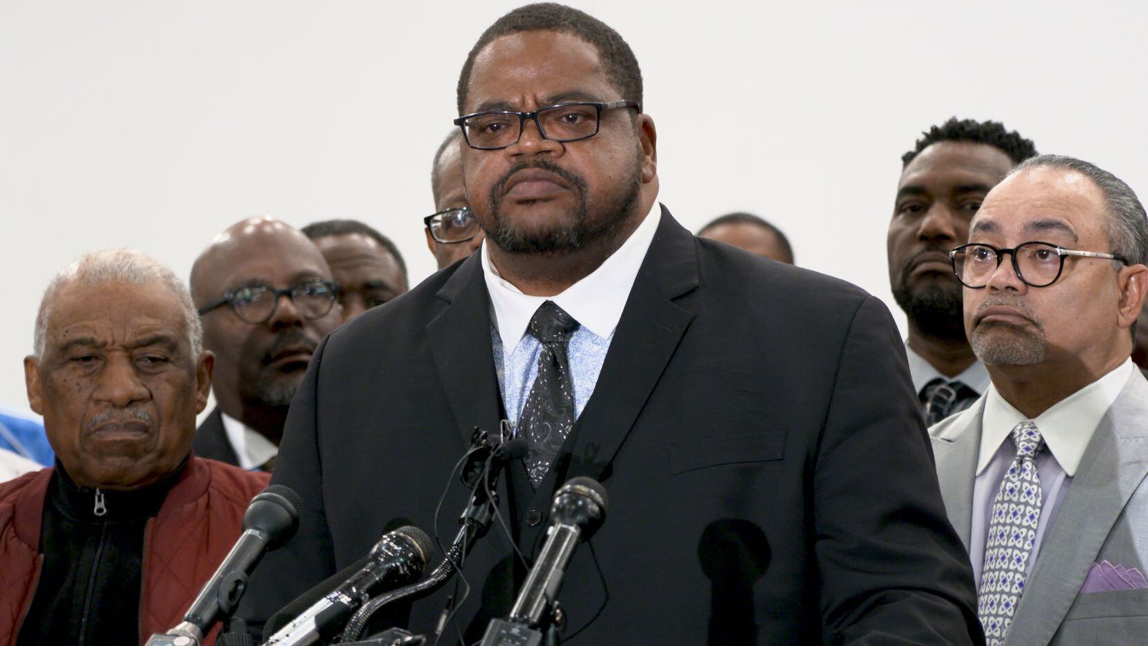 Pastor Kyev Tatum of the New Mount Rose Missionary Baptist Church speaks to the media at...
