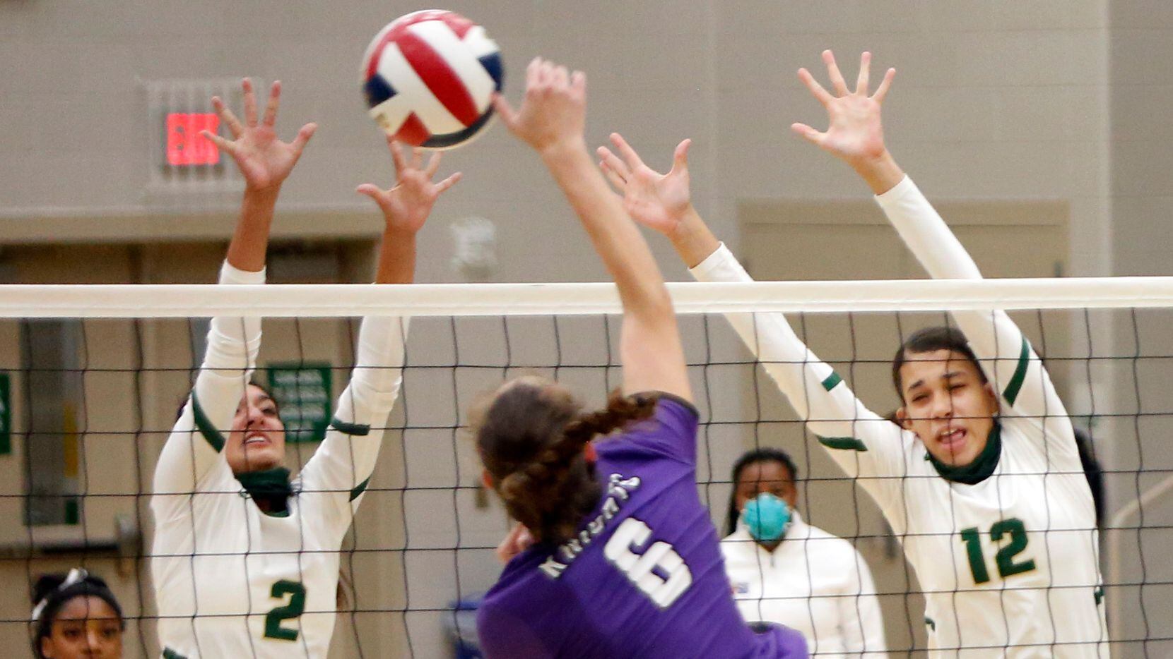 Frisco Independence outside hitter Reagan Bedell (6) attempts to squeeze a shot past the...