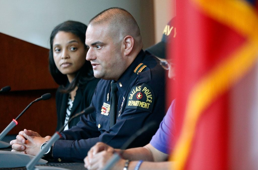 Dallas Police lieutenant and lead medical officer Alex Eastman answers a question during a...
