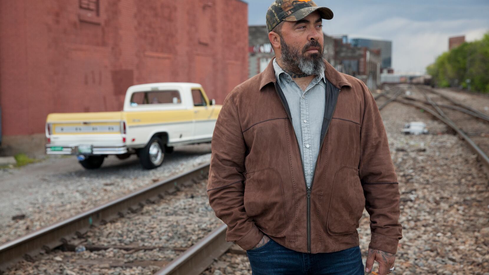 Aaron Lewis, frontman for the hard rock band Staind, released country album 'Sinner,'...