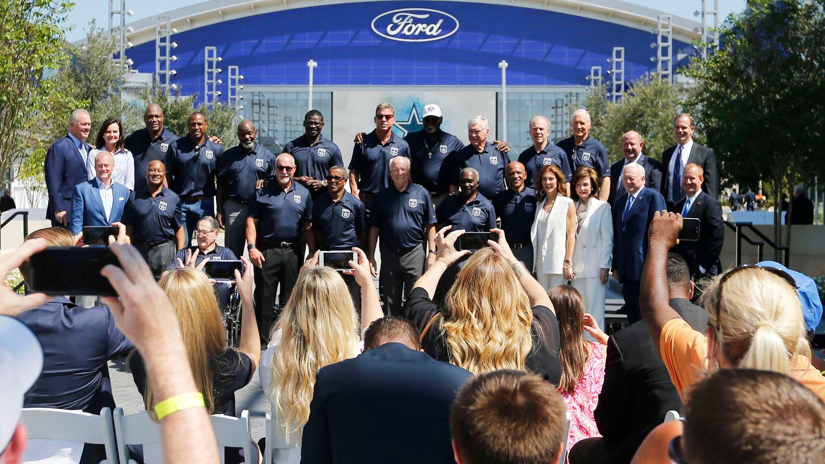 Dallas Cowboys owner Jerry Jones and family pose with the Dallas Cowboys Ring of Honor members during the Ring of Honor Walk unveiling ceremony at The Star in Frisco on Monday, Aug. 21, 2017. 