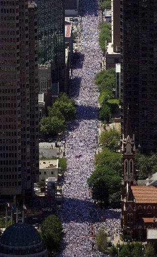 Tens of thousands took to the downtown Dallas streets on Palm Sunday 2006 to protest...