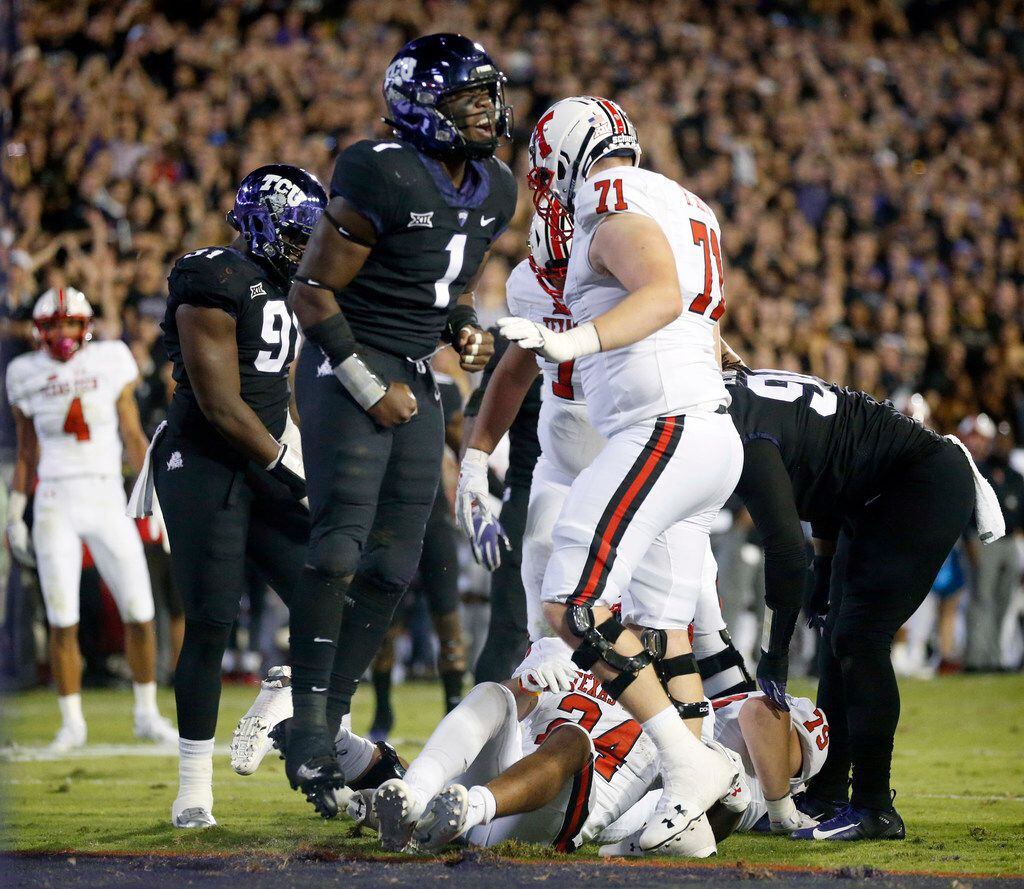 TCU Horned Frogs linebacker Jawuan Johnson (1) reacts after making a goal line stop of Texas...