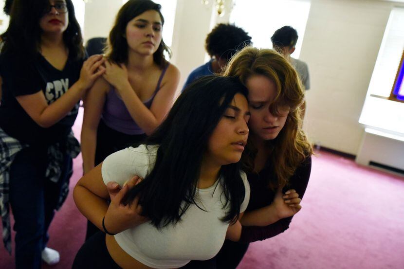 Leonela Argüello, 16, (front left) and Angie Hogue, 17, (right) rehearse Cry Havoc Theater...