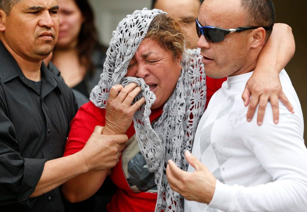  Norma Ochoa cried as her grandson, 16-year-old Jose Cruz, was buried. The teen was fatally...