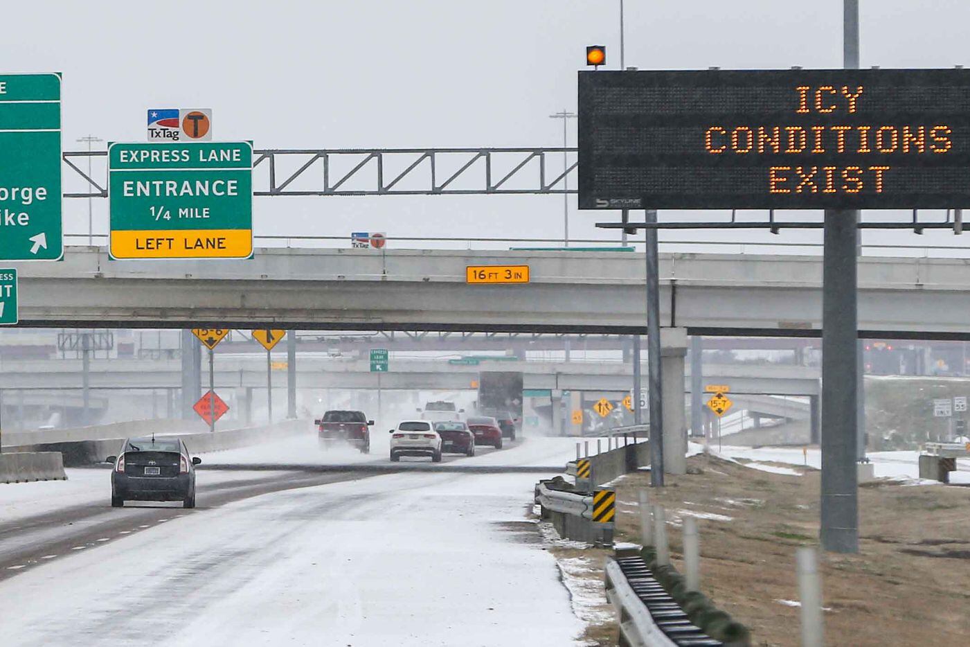 Traffic on Texas 114 TEXpress near MacArthur Blvd Winter flurries arrive in Irving on Sunday, February 14, 2021.