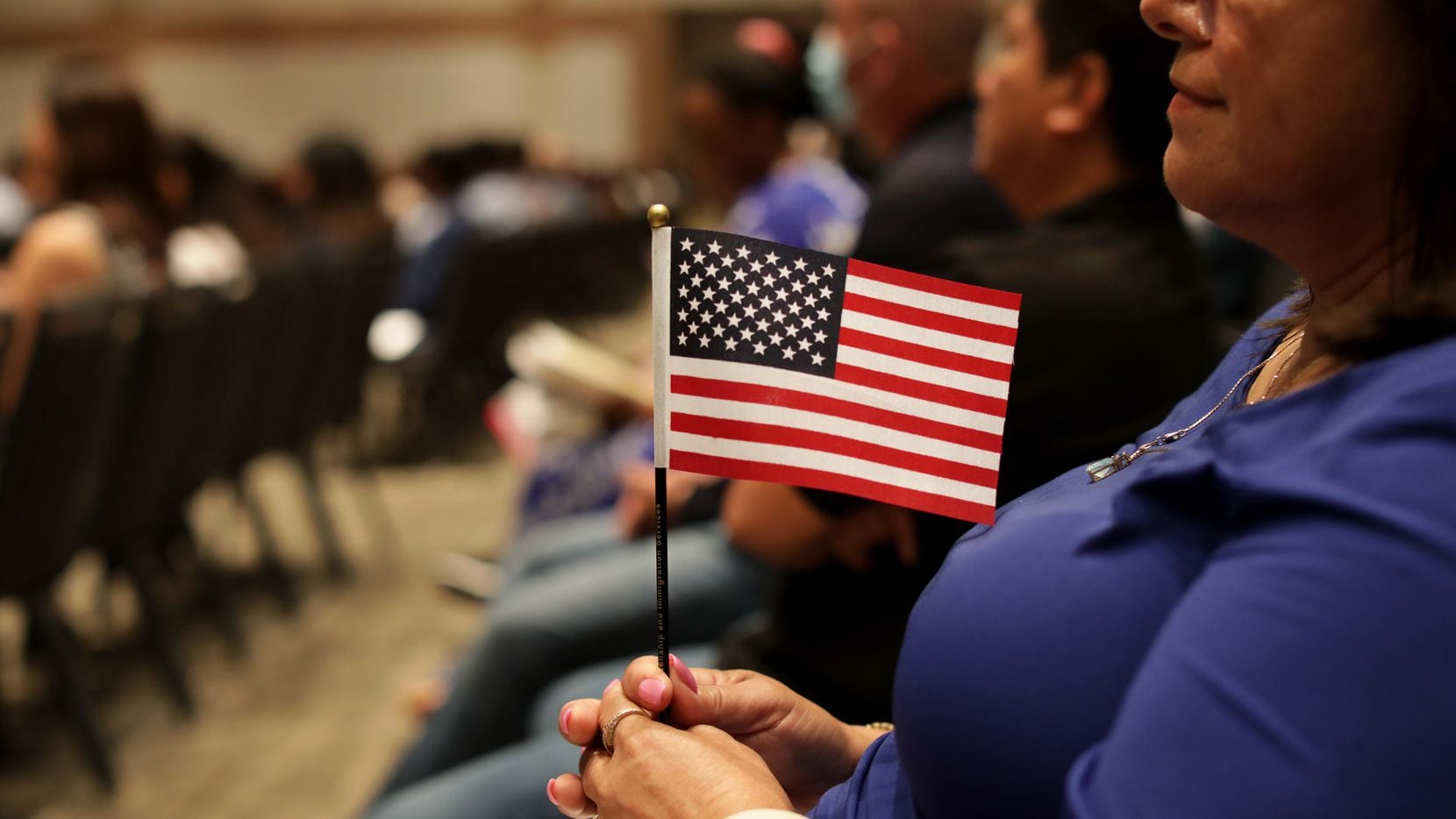 Approximately 650 people become United States citizens during a naturalization ceremony at...