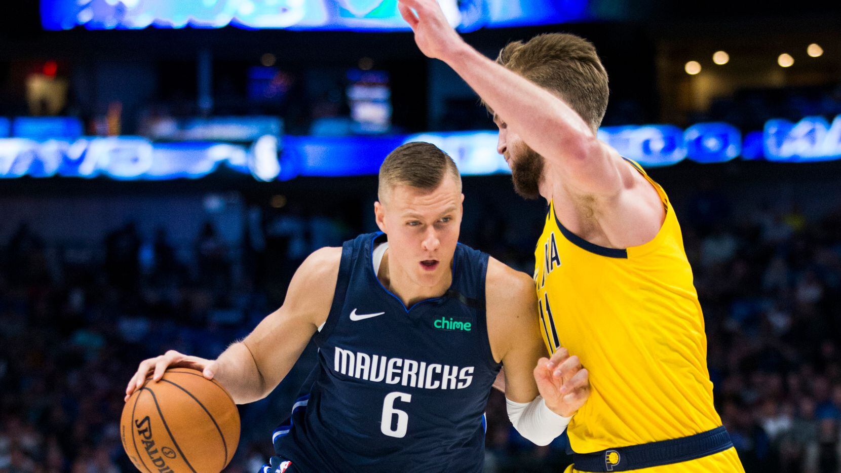 Dallas Mavericks forward Kristaps Porzingis (6) gets past Indiana Pacers forward Domantas Sabonis (11) during the second quarter of an NBA game between the Indiana Pacers and the Dallas Mavericks on Sunday, March 8, 2020 at American Airlines Center in Dallas.