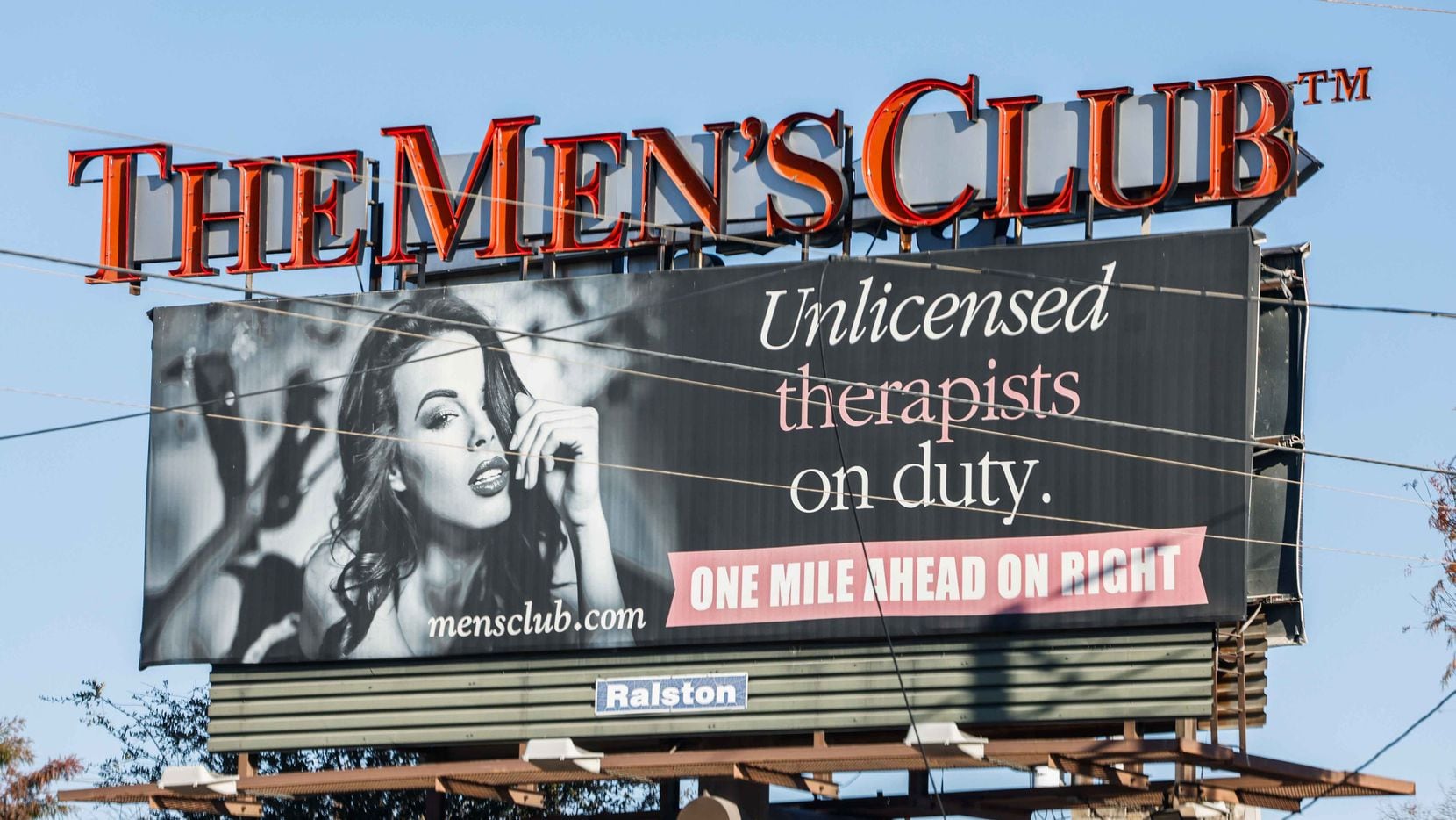 A The Men's Club billboard displayed on W Northwest Hwy in Dallas on Monday, December 6,...