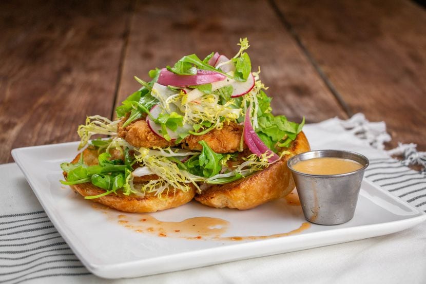 Edith's is offering crispy chicken croissant served with spicy sweet chili sauce, raclette...