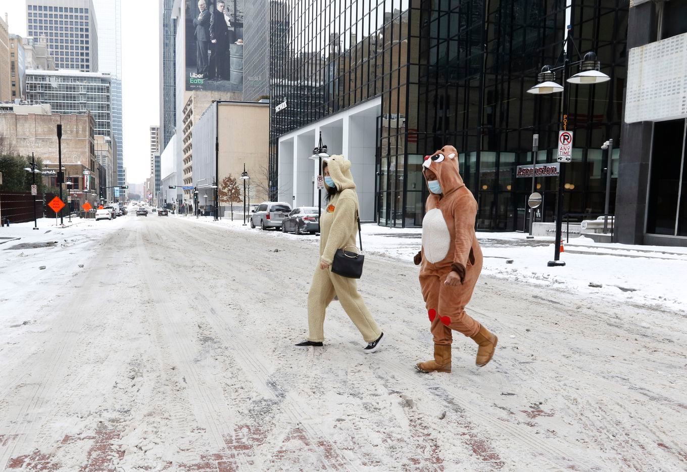Leighanne Katz, left, dressed in a Thunder Buddies costume and Billian Lawal, right, in a...