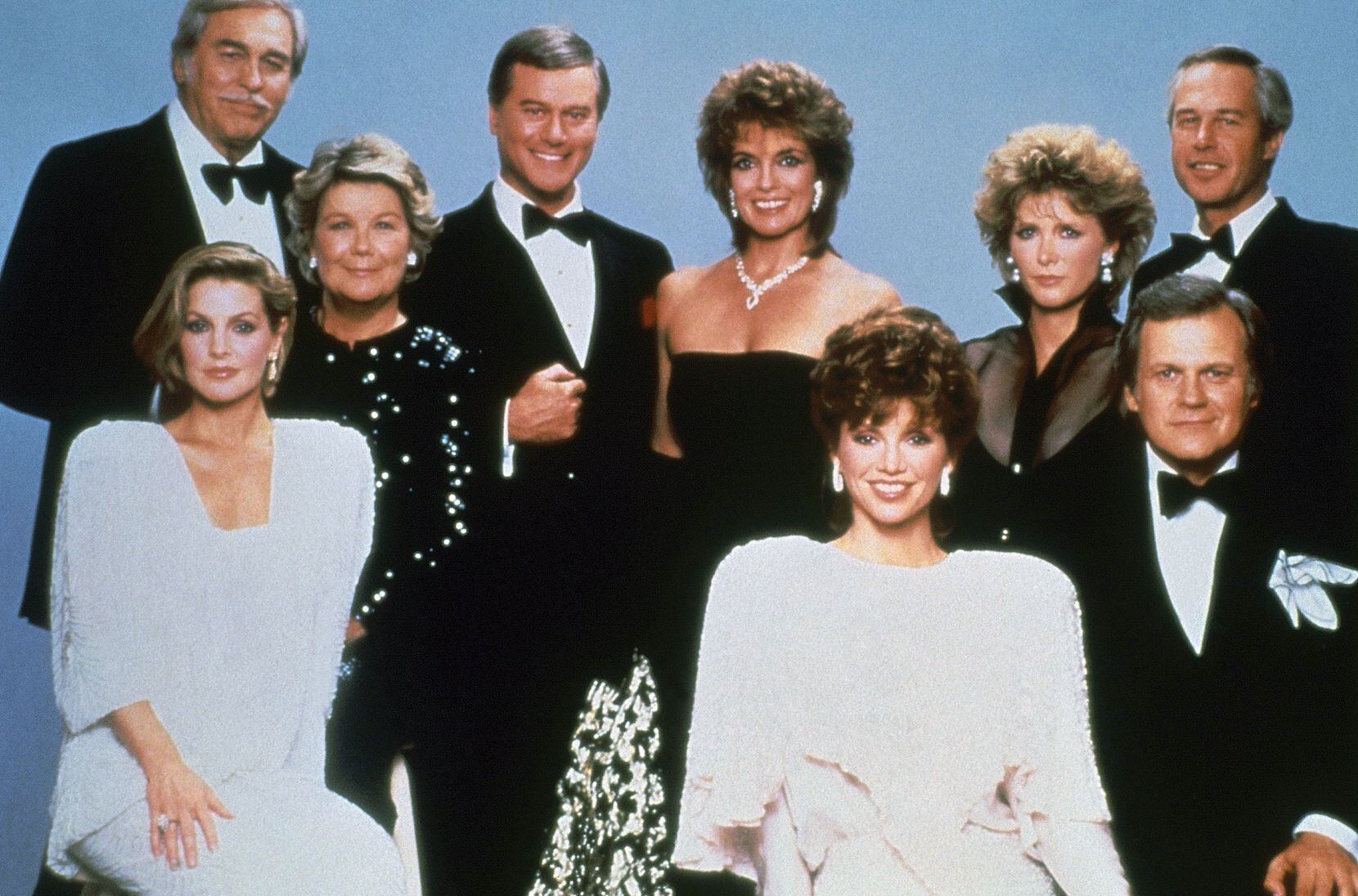 This 1983 photo shows the cast of the TV show "Dallas," including actor Larry Hagman, center...
