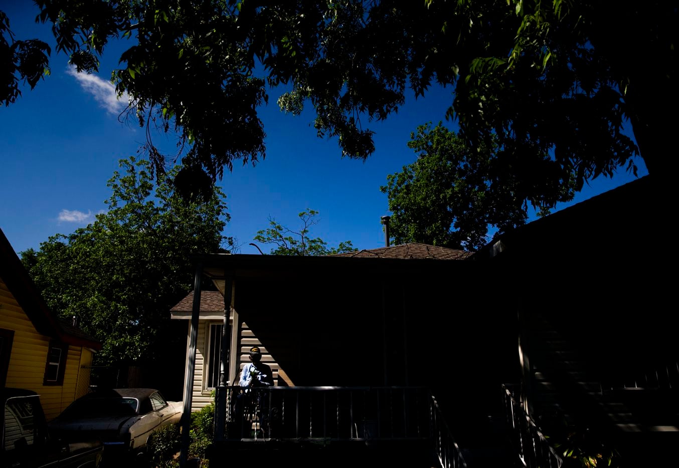 U.S. Army veteran Richard Overton, 111, sits on the front porch smoking a cigar at 10:38...