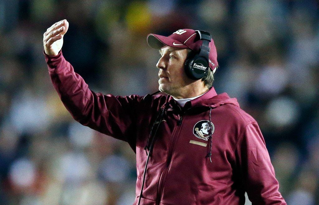 FILE - In this Oct. 27, 2017, file photo, Florida State head coach Jimbo Fisher directs his team during the first half of an NCAA college football game against Boston College in Boston.  In-state rivals Florida State and Florida have rarely experienced losing like this, the Seminoles need a victory to keep alive hopes of making a bowl game for the 36th consecutive year. The Gators are trying to send their seniors and interim coach Randy Shannon out on a high note to end one of the programâs worst seasons in decades.  (AP Photo/Michael Dwyer, File)