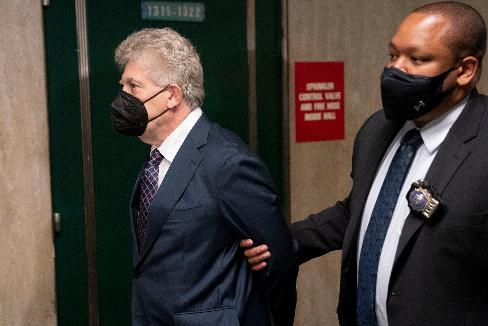 Glenn Horowitz, left, arrives to criminal court after being indicted for conspiracy...