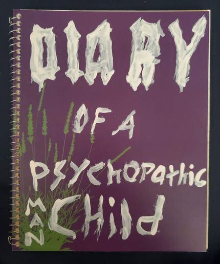 Image of a notebook labeled “Diary of a Psychopathic Man Child,” posted on social media by...