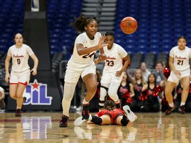 Frisco Liberty Jacy Abrii (24) steals the ball for an easy basket late in fourth quarter as...