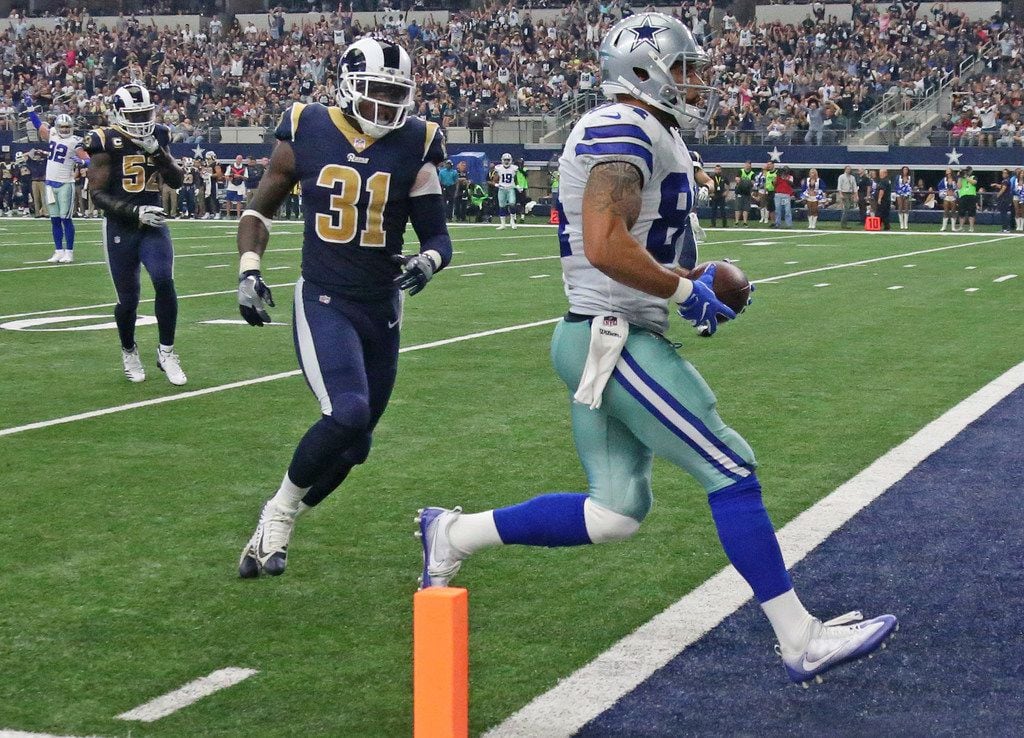 Dallas Cowboys tight end James Hanna (84) crosses the goal  line on a touchdown pass in the...