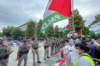 Law enforcement holds a line against Pro-Palestinian students at the University of Texas at...