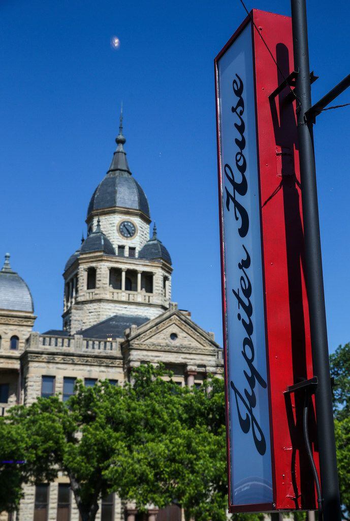 The Denton County Courthouse is seen through the window at Jupiter House coffee shop in Denton.