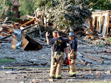 The Plano Fire Department works the scene after a home exploded at about 4:45 p.m. in the 4400 block of Cleveland Drive in Plano on Monday, July 19, 2021. (Stewart F. House/Special Contributor)