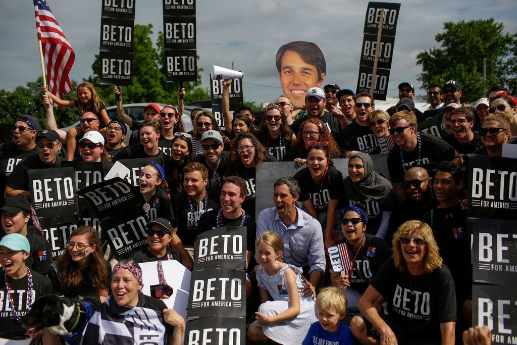 Democratic presidential candidate Beto O'Rourke posed for a photo with his campaign workers during the Fourth of July parade on in Independence, Iowa, on Thursday. Democratic candidates for president including Joe Biden, Kamala Harris, Pete Buttigieg and Bernie Sanders celebrated America's independence in Iowa.