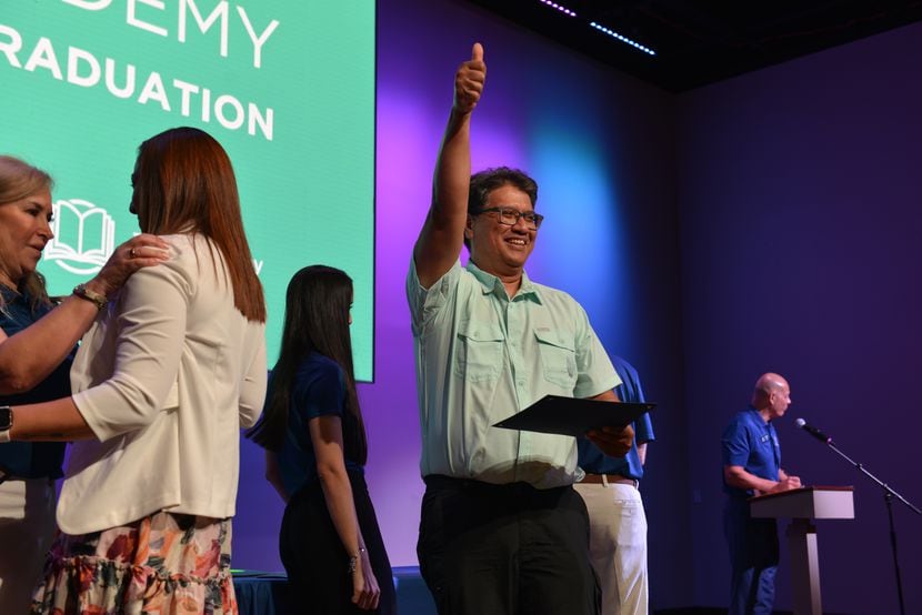 Andres Tovar walks the stage at The Academy's spring 2023 graduation (Courtesy of The...