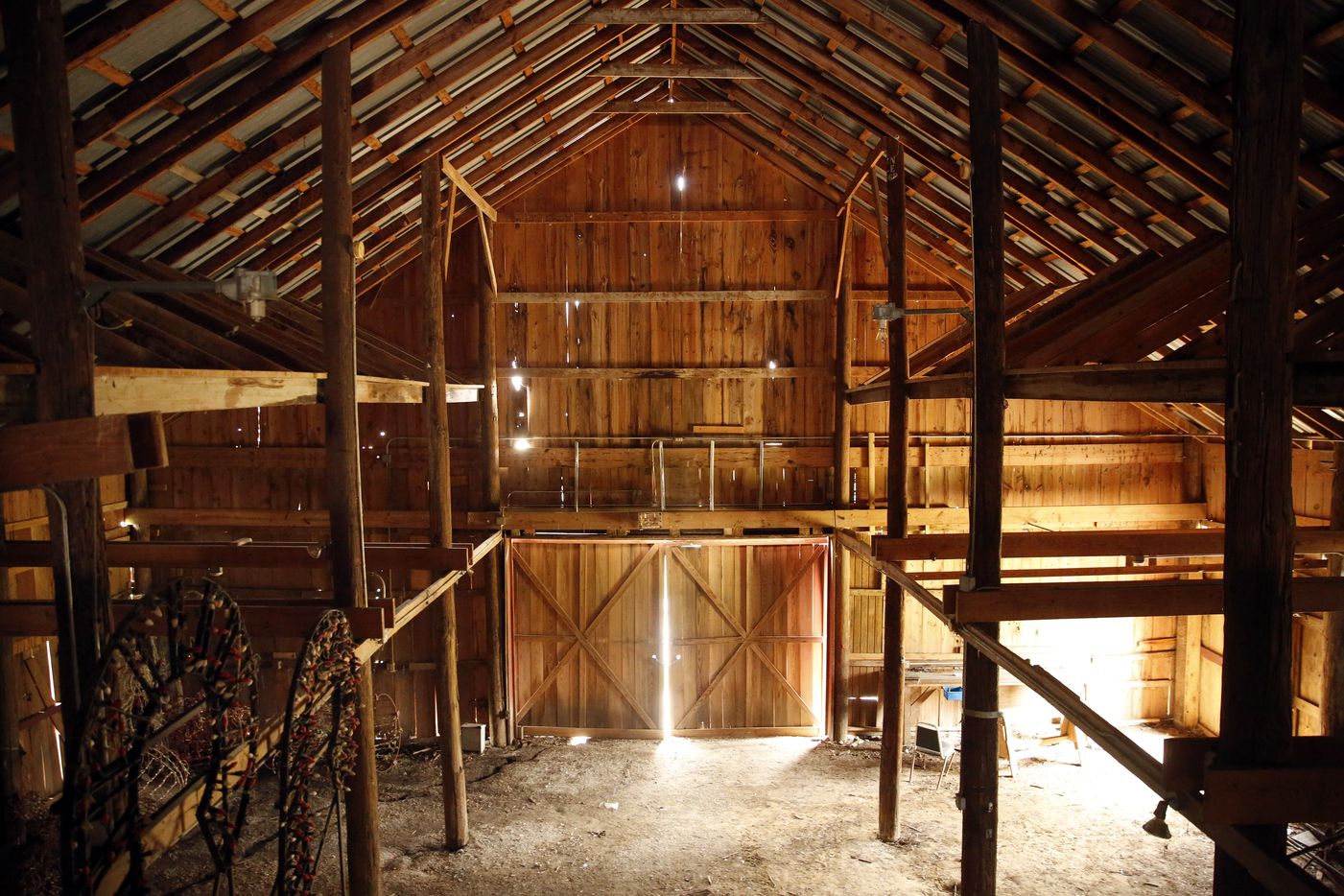 An interior view of the big red barn that is the centerpiece of Dallas Parks and...