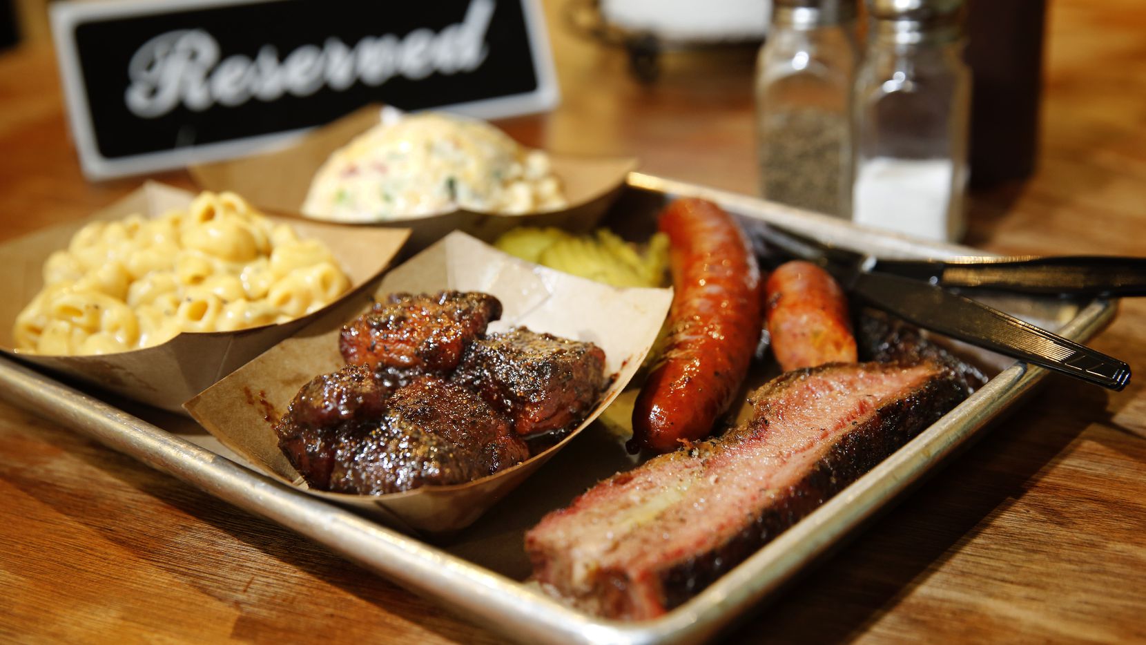 Heim Barbecue sells green chile mac & cheese, twice-baked potato salad, bacon burnt ends,...