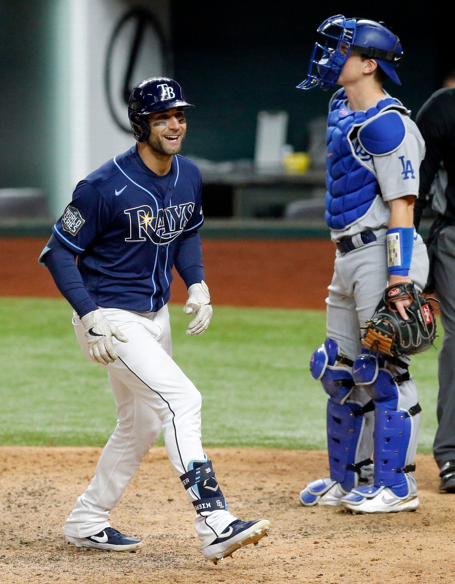 Photos: Randy Arozarena lays on home plate after game-winning run, Rays  celebrate victory over Dodgers