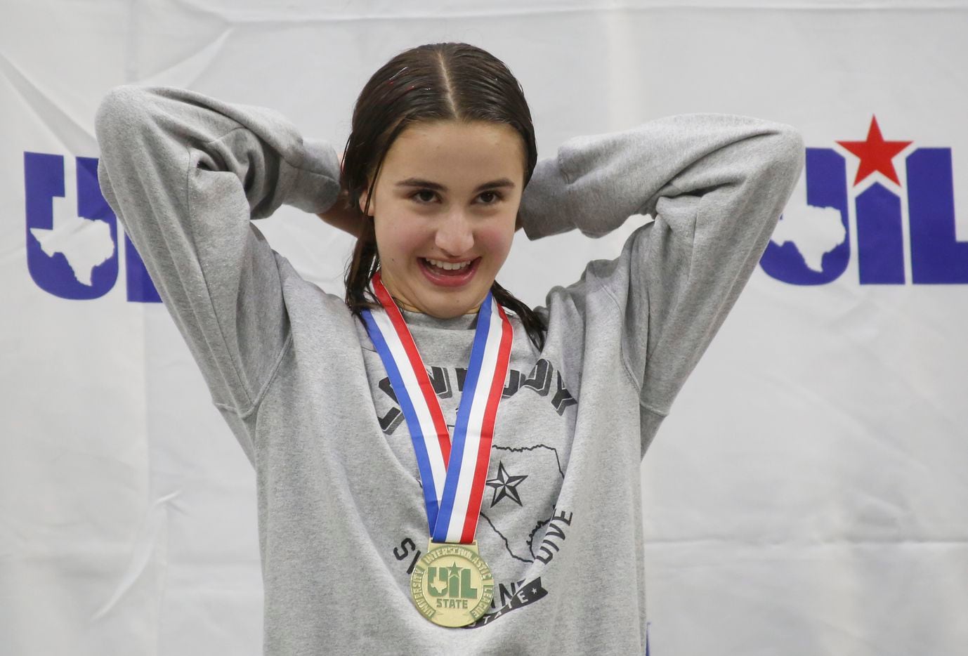 Lucas Lovejoy diver Maria Faoro sports a smile after being awarded her first place medal in...