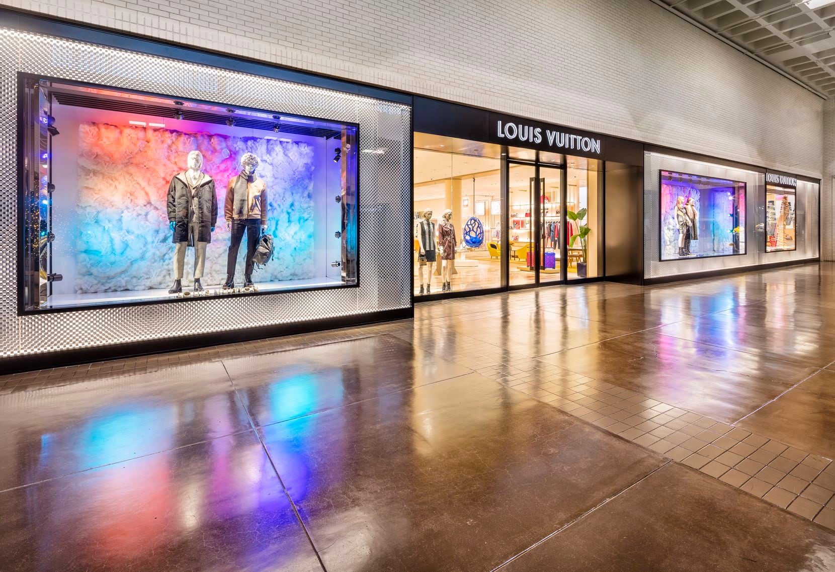 The reopened Louis Vuitton store is next to Nike and took in the two adjacent spaces vacated...