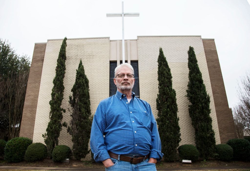 John Smid, the former director of Memphis-based ex-gay ministry Love In Action, poses for a photograph in front of his church in Paris, Texas on Dec. 7, 2018. A character is based off him in the new movie "Boy Erased," which came out in November. 