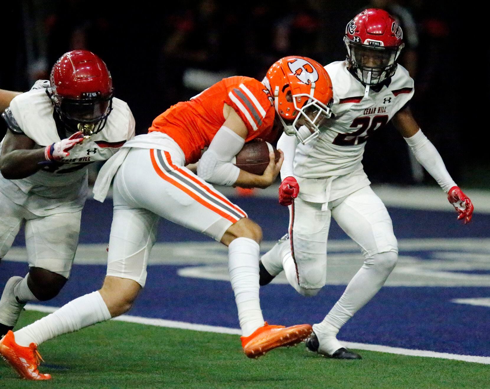 Rockwall High School quarterback Mason Marshall (16) scores the first touchdown of the game...