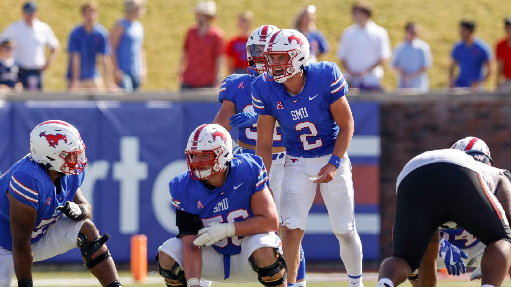 SMU quarterback Preston Stone (2) yells to his teammates during the second half of an NCAA...